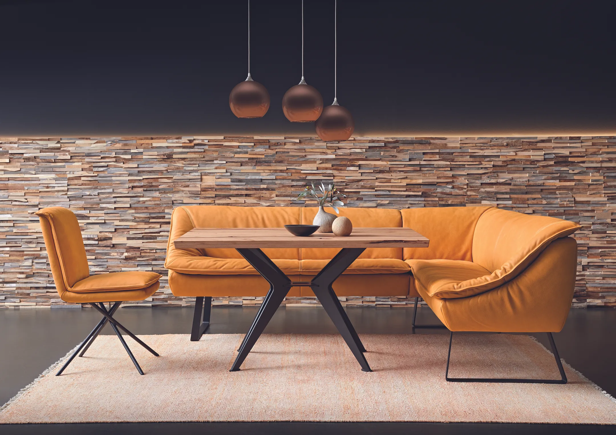 A picture of an orange leather corner sofa